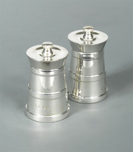 Lot 437 - A pair of 20th century silver pepper mills