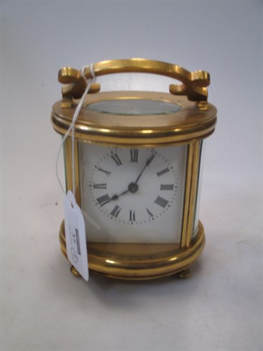 Lot 37 - A French gilt brass carriage timepiece