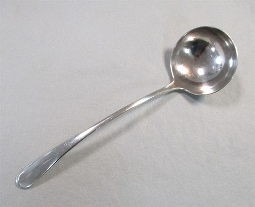 Lot 395 - An Edward VII silver soup ladle
