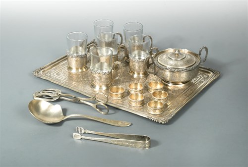 Lot 311 - An Iranian metalwares tea service