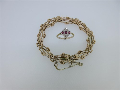 Lot 190 - An Art Deco ruby and diamond ring together with a fancy gatelink bracelet