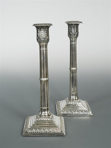 Lot 365 - A pair of Victorian silver candlesticks