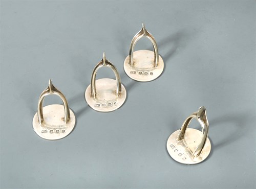 Lot 448 - Edinburgh - A set of four George V silver menu holders