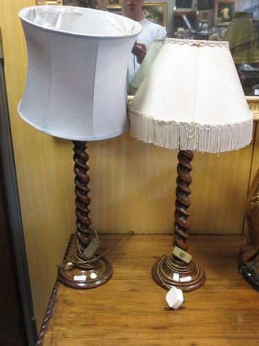 Lot 553 - A pair of 17th century style walnut...