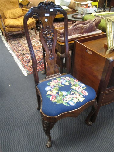 Lot 580 - A pair of Dutch Colonial style carved rosewood...