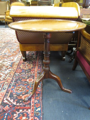 Lot 601 - A George III mahogany tripod wine table, on...