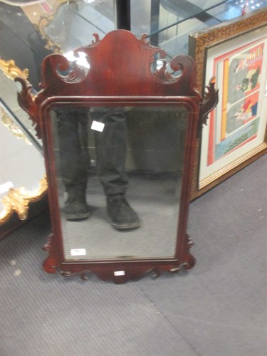 Lot 479 - A Regency gilt wood and ebonised convex wall...