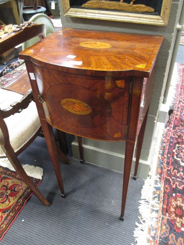 Lot 572 - A Regency mahogany and shell marquetry bedside...