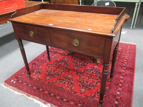 Lot 693 - A late Regency mahogany dressing table 106 w cm