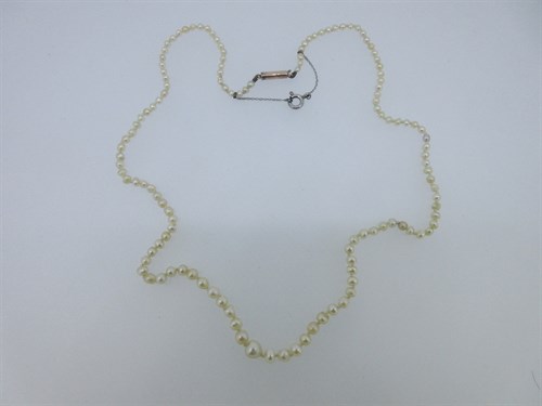 Lot 191 - A graduated string of small pearls believed to be natural