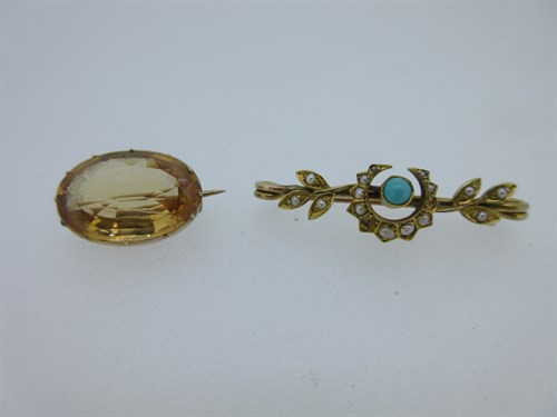 Lot 157 - A topaz lace pin and a turquoise and seed pearl brooch