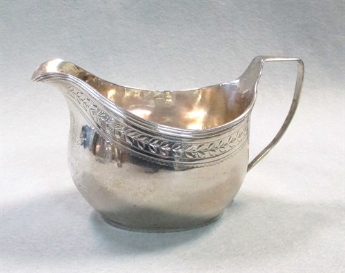 Lot 349 - A George III silver cream jug