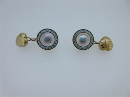 Lot 156 - A pair of turquoise enamel and mother-of-pearl cufflinks