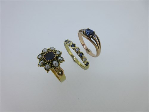 Lot 42 - A collection of three sapphire and gemstone rings set in gold