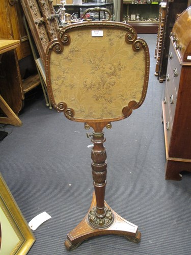 Lot 629 - A Regency rosewood floral panel pole screen...