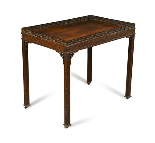 Lot 529 - A George III and later mahogany 'Chinese Chippendale' design silver table, with pierced raised edge, on four chamfered moulded legs