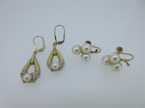 Lot 52 - Two pairs of cultured pearl earrings both stamped for 14ct gold