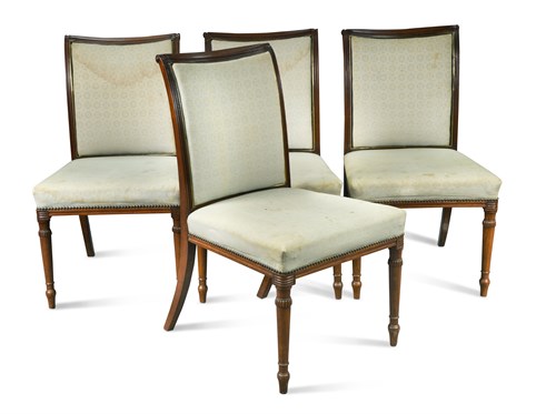 Lot 620 - A set of four early 19th century brass mounted mahogany side chairs