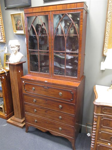 Lot 338 - A George III mahogany secretaire bookcase 207...