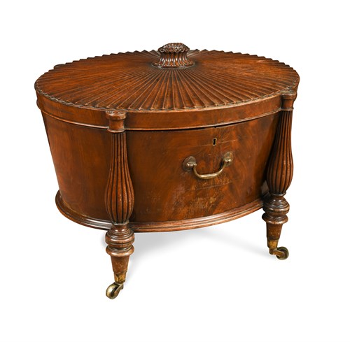 Lot 582 - A George III mahogany oval wine cooler