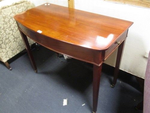 Lot 397 - A Regency mahogany bow front side table