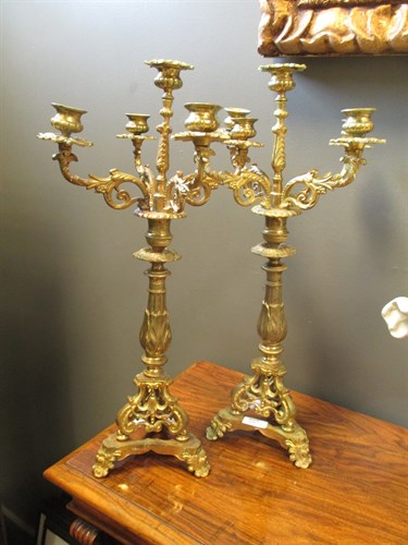 Lot 352 - A pair of ornate brass candelabra (2)