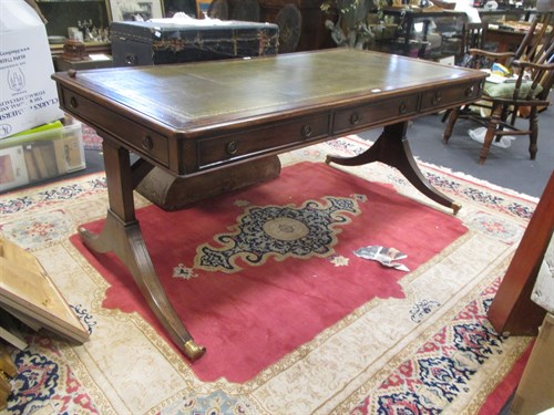 Lot 477 - A modern Regency style mahogany library table...