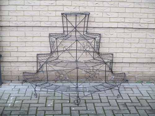 Lot 878 - A Victorian wirework conservatory plant stand