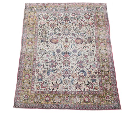 Lot 539 - A Kashan ivory ground rug