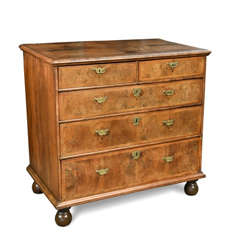 Lot 475 - An early 18th Century walnut chest of drawers