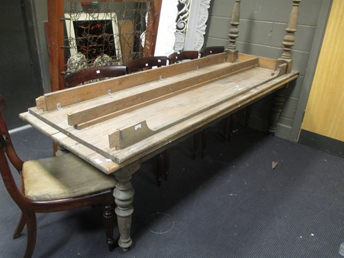 Lot 417 - A long pine table in 2 parts. Approximately...