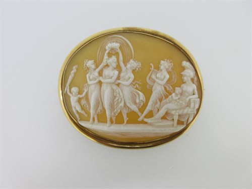 Lot 178 - An antique cameo brooch depicting a terpsichorean scene