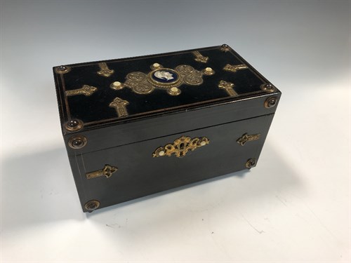 Lot 382 - A Victorian ebonised teacaddy, of rectangular...
