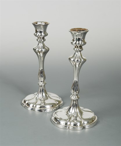 Lot 292 - A pair of Victorian silver plated candlesticks