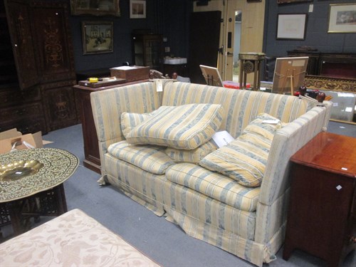 Lot 467 - A Knowle sofa upholstered in a yellow...