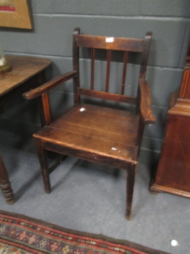Lot 420 - A 19th century beechwood lath back armchair...