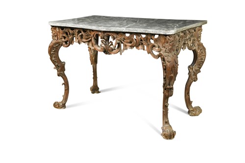 Lot 595 - A George I carved pine wood serpentine console table