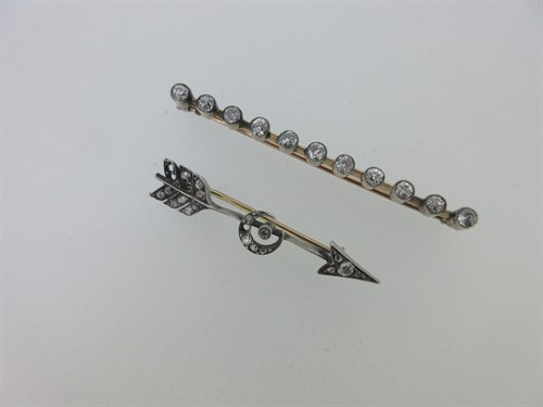 Lot 49 - Two antique diamond brooches - a bar and an arrow