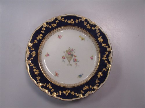 Lot 21 - A set of seven Royal Crown Derby plates,...