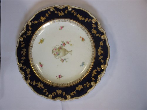 Lot 21 - A set of seven Royal Crown Derby plates,...