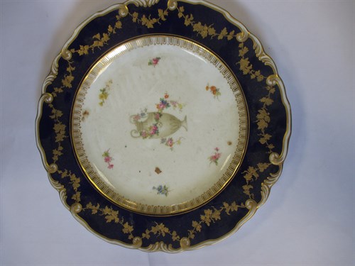 Lot 21 - A set of seven Royal Crown Derby plates,...