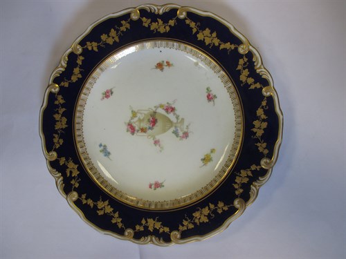 Lot 21 - A set of seven Royal Crown Derby plates,...