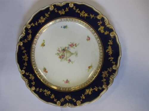 Lot 21 - A set of seven Royal Crown Derby plates,...