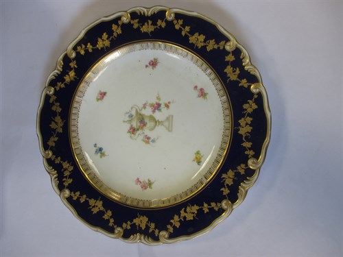Lot 21 - A set of seven Royal Crown Derby plates,...
