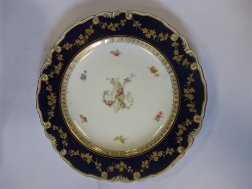 Lot 21 - A set of seven Royal Crown Derby plates,...