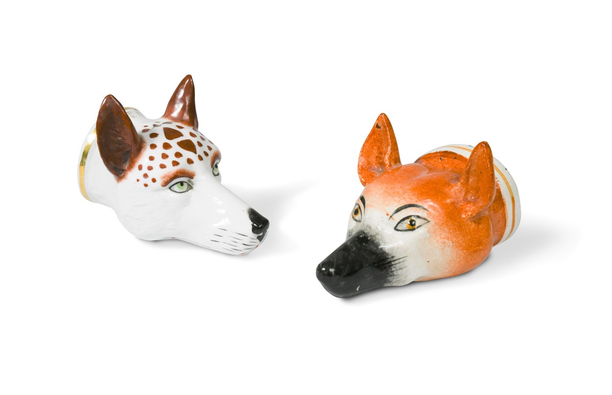 Lot 8 - A 19th century pottery fox head stirrup cup