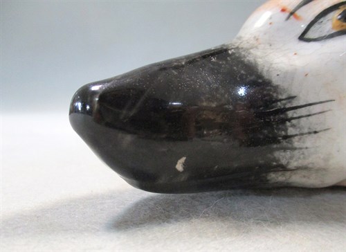 Lot 8 - A 19th century pottery fox head stirrup cup