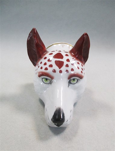 Lot 8 - A 19th century pottery fox head stirrup cup