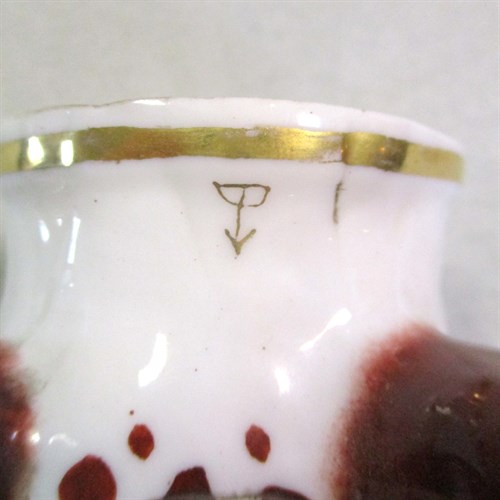 Lot 8 - A 19th century pottery fox head stirrup cup