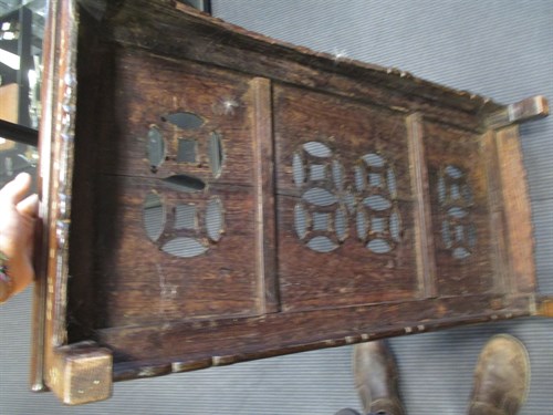 Lot 643 - A low Chinese table with glass top and mother...